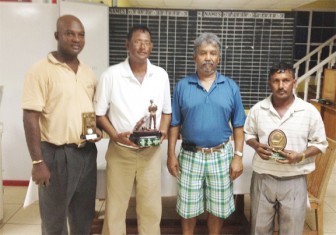 The winner Patrick Prashad (second left) with Brian Hackett, Hilbert Shields and Mike Mangal.