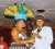 A colourful peacock hat made of feathers, plastic, Styrofoam and cotton is one of Pamela  Arthur’s hats. A smiling Pamela is seen in picture collecting her winning prize from an  official of the Inner Wheel Hat Show