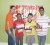 The winners of the Smalta Kite Flying Competition pose with their prizes. In photo with a representative from Smalta are (from left) Alex Persaud, Noel Moraglia and Andrew Ramphaul.