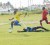 Pele striker Stellon David dribbles past an outstretched Buxton United goalkeeper Jason Cromwell in their Super League match at BV Community Centre ground. 