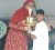 Widow of Zaid Ali, Zamin Ali of Trinidad and Tobago presenting an award in his name to Muzzammil Bacchus of Guyana for being the most improved junior