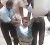 Denzel Kitsu being lifted into the courtyard by policemen after he was remanded. Inset are the indentations and blood spatters that were left after Kitsu hitting his head against the courtroom wall. 