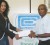 Company Secretary and Administrative Director of Caribbean Container Inc, Ms. Patricia Bacchus hands over the sponsorship cheque at the company’s head office, Farm, East Bank Demerara to secretary of the GCF Vishnu Rampersaud.   