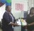 Principal of St Rose’s High Ercellen Cummings-Archibald (left) receives the items donated by the St Rose’s High United States and Canada alumni yesterday at the school’s computer room. Presenting the donation is US alumni representative Debra Billingy (right)