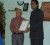  DDL Group Chair Dr Yesu Persaud receives the certificate from Shane Kissoon, Manager ACCA Southern Caribbean (right)