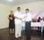Region 6 Chairman, David Armogan presents a certificate to a participant of the CSP Port Mourant Batch 3