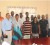 Minister of Local Government and Regional Development, Ganga Persaud (left in front row) and Region Seven Chairman Gordon Bradford (second from left in front row) with the members of the IMC. (GINA photo)