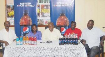 President of the Guyana Amateur Boxing Association (GABA) Steve Ninvalle (centre) makes a point at the launching of the Pepsi/GABA Under-16 Development Programme yesterday while from left GABA’s Vice-President Eustace Cuffy, Sales Manager of DDL, Alexis Langhorne, former world champion Andrew ‘Sixhead’ Lewis and GABA’s Technical Director Terrence Poole look on. (Orlando Charles photo)