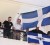 Supporters of Greece’s extreme right Golden Dawn party hold flags from their party’s headquarters in Athens yesterday. REUTERS/Yorgos Karahalis