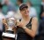 Maria Sharapova of Russia holds the trophy as she poses during the ceremony after defeating Sara Errani of Italy during their women’s singles final match at the French Open tennis tournament at the Roland Garros stadium in Paris today. (Reuters/Benoit Tessier)