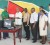 Regional chairman, Bindrabhan Bisnauth (third, left) receiving a sample of the items from FFTP representative in Berbice, Alex Foster in presence of other regional officials