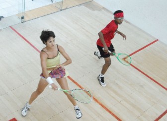 Out of his league: Caribbean Under 15 Champion had no chance against Guyana’s world class women’s squash star Nicolette Fernandes. (Orlando Charles photo)
