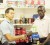 Winston George (right) receives his supplement hamper from Fitness Express owner Jamie McDonald.