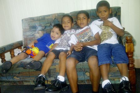 (From left)  Lorenzo, Tyrone, Andre and Anthony in the office of the Child Protection Agency