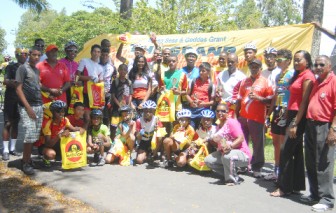 Winners and runners-up pose with their hampers and prizes compliments of Geddes Grant (Guyana) Limited, through its Seven Seas range of products at the completion of yesterday’s 11-race cycling programme at the National Park. (Orlando Charles)
