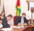 From right, Minister of Home Affairs, Clement Rohee; United States Ambassador to Guyana, Brent Hardt; Regional Manager, CCP – Troels Vester and Guyana Revenue Authority (GRA) Commissioner General, Khurshid Sattaur affixing their signatures. (GINA photo)