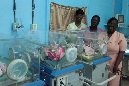 The triplets in the Georgetown Public Hospital’s Neonatal Unit, with (from left to right) Midwife Dawn Stuart, Ward Manager Sister Vernie Batson-Lord and Senior Departmental Supervisor of the Maternity Unit Sister June Cato. 