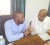  Region Ten Chairman Sharma Solomon (left) and Minister in the Ministry of Local Government Norman Whittaker deliberating on the Kwakwani IMC issue in Linden yesterday
