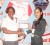 Shafeena Juman of Hand in Hand Group of Companies (right) hands over the sponsorship cheque to Claudette Thibaud of the Salvation Army