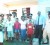 Top Cop visits slain bystander’s family: Dameon Belgrave’s relatives including his mother, Donna Sulker (fifth from right), Police Commissioner, Leroy Brummel (third  from right) and APNU Member of Parliament, Joe Harmon (second  from right),  during a visit to Belgrave’s home yesterday. (See story on page 12)
