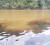 The dark water of the Kako River meeting the discoloured water of the Mazaruni River as photograph-ed during a visit by Stabroek News earlier this year. 