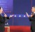 U.S. President Barack Obama (R) and Republican presidential nominee Mitt Romney (L) speak during the second U.S. presidential debate in Hempstead, New York October 16, 2012.