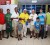 Ralph Persaud, Managing Director of King’s Jewellery World and his two sons pose with winners and officials at the Lusignan Golf Club.