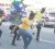 Courts flash mob dancers stopped to entertained persons as they do the gangnam style on Avenue of the Republic Friday as part of Courts 19 anniversary celebrations.
