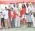 Digicel Classic winners Mo Shafi and Christine Sukhram with their red jackets show off the trophies they won yesterday at the fourth annual Digicel Classic golf tournament.
