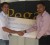 Marketing and Sales Manager of Pegasus, Troy Edmonson (left) to Sandeep Chand, Public Relations Officer of the Guyana Tennis Association
