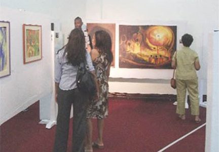 Visitors at the Guyana Women Artists Association Exhibition, 2012 (Stabroek News file photo)