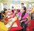 An allottee pulling her lot number during the ‘One Stop Shop’ allocation exercise at the Blairmont Community Centre Ground, West Coast Berbice on Wednesday. (Government Information Agency photo)