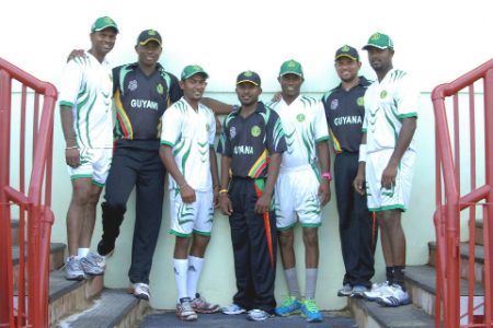  Some members of the Guyana T20 team showcase the new uniforms. From left, Shivnarine Chanderpaul, Christopher Barnwell, Devendra Bishoo, Veerasammy Permaul, Trevon Griffith, Ramnaresh Sarwan and Narsingh Deonarine. (Orlando Charles photo)