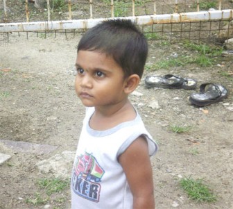 Little Aditya stares in the direction of the camera as his picture was taken