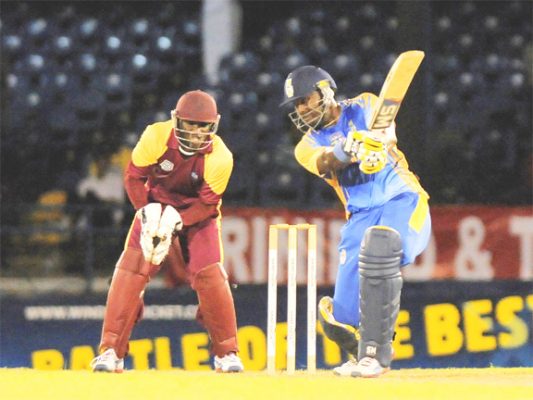 Barbados skipper Dwayne Smith belts a delivery from Justin Athanaze, not in picture for another boundary. (Photo courtesy WICB media)