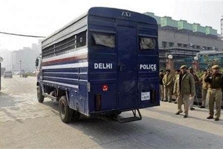 A police van carrying five men accused of the gang rape and murder of an Indian student arrives at a court in New Delhi January 7, 2013. (Reuters/Stringer)