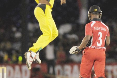 Jamaica’s Sheldon Cotterell jumps for joy after his dismissal of Trinidad’s Jason Mohammed. (photo courtesy of WICB Media)
