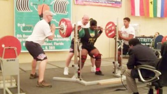 Dawn Barker squatting during NAPF Power lifting championships