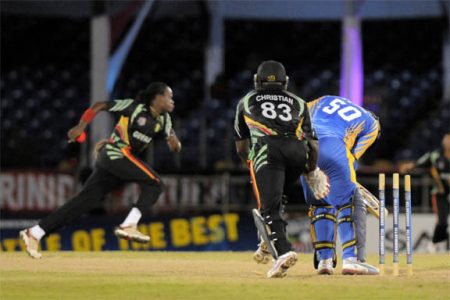KEY WICKET! Guyana’s Steven Jacobs is delighted with the wicket of Barbados captain Dwayne Smith. (Photo courtesy of WICB media)