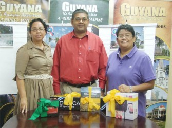 In photo from left are Melanie McTurk representing Duane Defreitas, Indranauth Haralsingh and Amanda Richards.