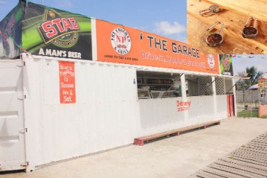 The Garage on Aubrey Barker Road. Inset are the padlocks which the bandits somehow pried open. (Photo by Arian Browne)