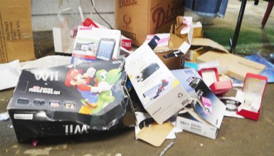  Empty gadget boxes dumped outside Jacqueline Rose’s stall