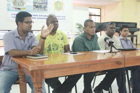 Coordinator of the UGSS Marvin Wray (centre) with other members of the UGSS at yesterday’s press conference. 