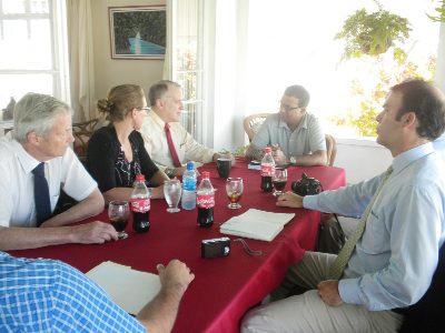 The Panthera delegation meeting with Minister Robert Persaud (at head of table)
