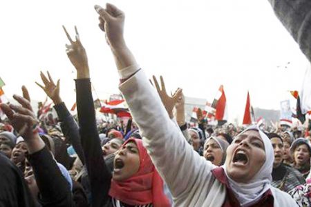 Women shout during a protest in Tahrir Square in Cairo January 25, 2013. Egypt marks the second anniversary of the uprising that swept Hosni Mubarak from power with little to celebrate. Deeply divided and facing an economic crisis, the nation is bracing for more protests, but this time against a freely elected leader. (REUTERS/Mohamed Abd El Ghany)