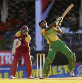 Top scorer Miles Bascombe gathers more runs during his 29. (Photo courtesy WICB)