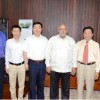 The Bai Shan Lin Forest Development Inc team with President Donald Ramotar (third from right) and Minister of Natural Resources and the Environment Robert Persaud (left) (GINA photo)