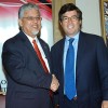 Planning Minister Dr Bhoe Tewarie, left, exchanges greetings with president of the Inter-American Development Bank Luis Alberto Moreno after they signed off on a US$246.5 million facility at Hilton Trinidad in St Ann’s yesterday. (Trinidad Express photo)