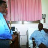 Prime Minister Sam Hinds and Oscar Clarke speaking today at the Georgetown Public Hospital. (GINA photo)