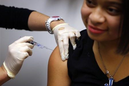 Jasmine Rodriguez, 10, gets an influenza vaccine at Boston Children’s Hospital in Boston, Massachusetts January 10, 2013.
Credit: Reuters/Brian Snyder